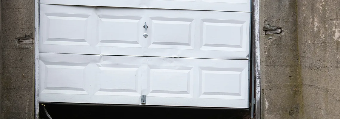 Garage Door Got Hit By A Car Dent Removal in Bolton, ON