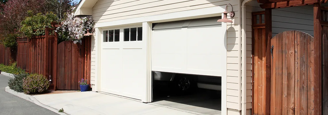Fix Metal Garage Door Jerking in Bolton, Ontario